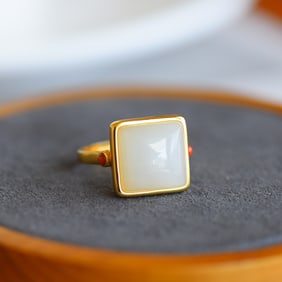 An Exquisite Sterling Silver-Gold Plated Inlaid White Jade Ring