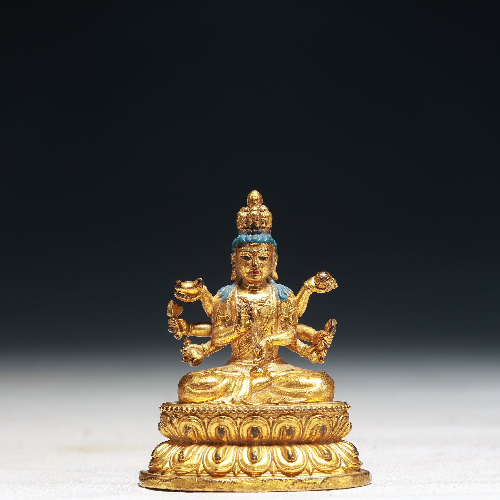 A Solemn Gilt Bronze Statue of Six-armed Avalokitesvara: A Solemn Gilt Bronze Statue of Six-armed Avalokitesvara,Qing Dynasty,China,Size:2inx1.2inx2.4in,Weight:100g
