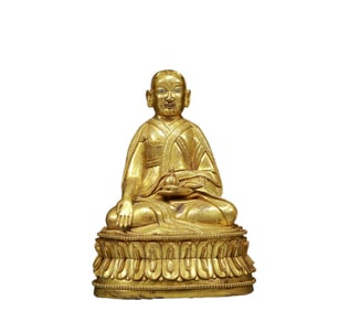 A Solemn Gilt Bronze Statue of Guru