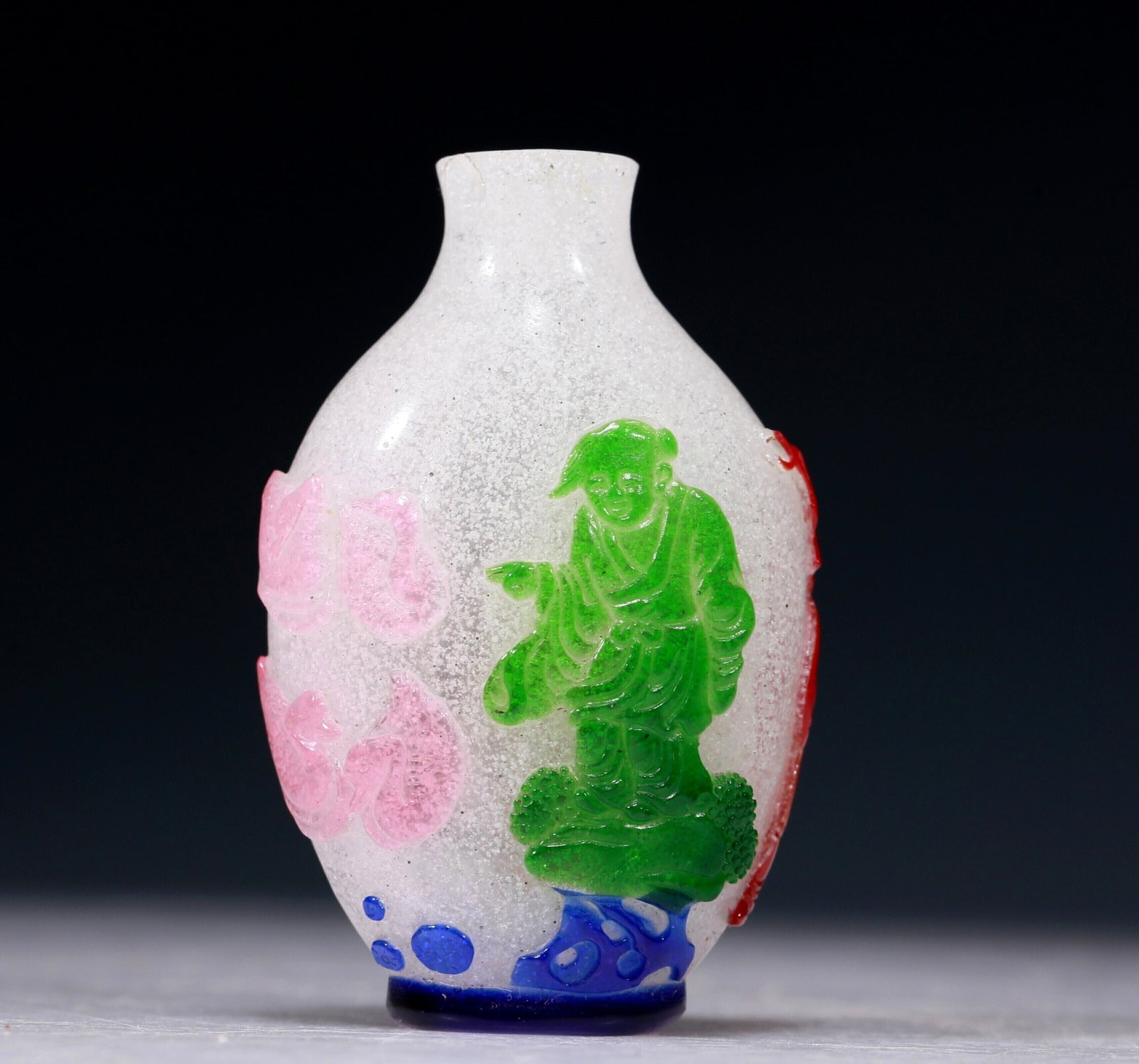 An Excellent Multi-Color Overlay Snowflake Glass 'Figure' Snuff Bottle: An Excellent Multi-Color Overlay Snowflake Glass 'Figure' Snuff Bottle. Each's body is rendered clad in long, flowing robes, the voluminous drapery elegantly cascading in folds. Chinese Qing Dynasty. 