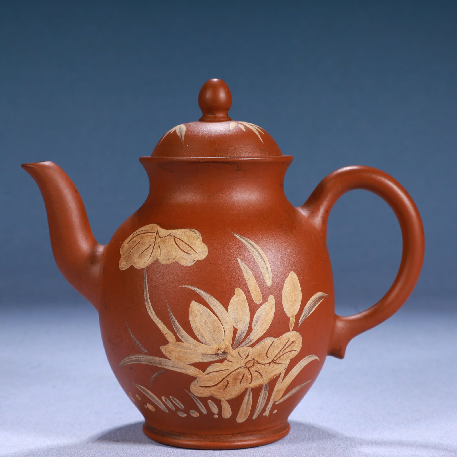 An Exquisite Purple Sands Flower Pattern Teapot: An Exquisite Purple Sands Flower Pattern Teapot,Qing Dynasty, China,Qianlong Six-character Mark,Size:5.7inx3.1inx5in,Weight:270g
