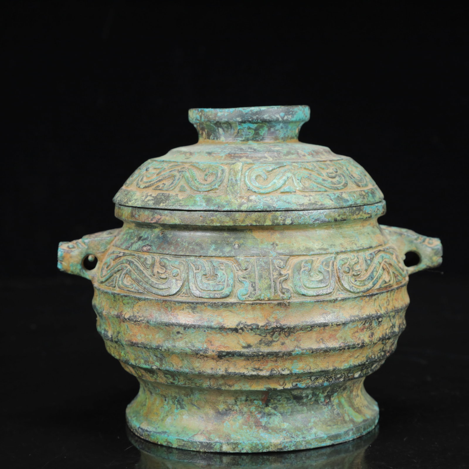 An Archaic Bronze Dragon Pattern Beast-Ears Cover Jar,with Inscription: An Archaic Bronze Dragon Pattern Beast-Ears Cover Jar,with Inscription,the Warring States Period in China,Size:6.3inx5.1inx5.5in,Weight:1400g