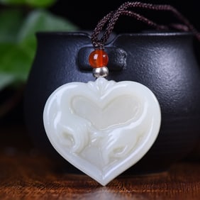 An Exquisite White Jade Heart-Shaped Pendant