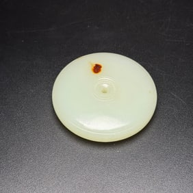 An Exquisite White Jade Pendant