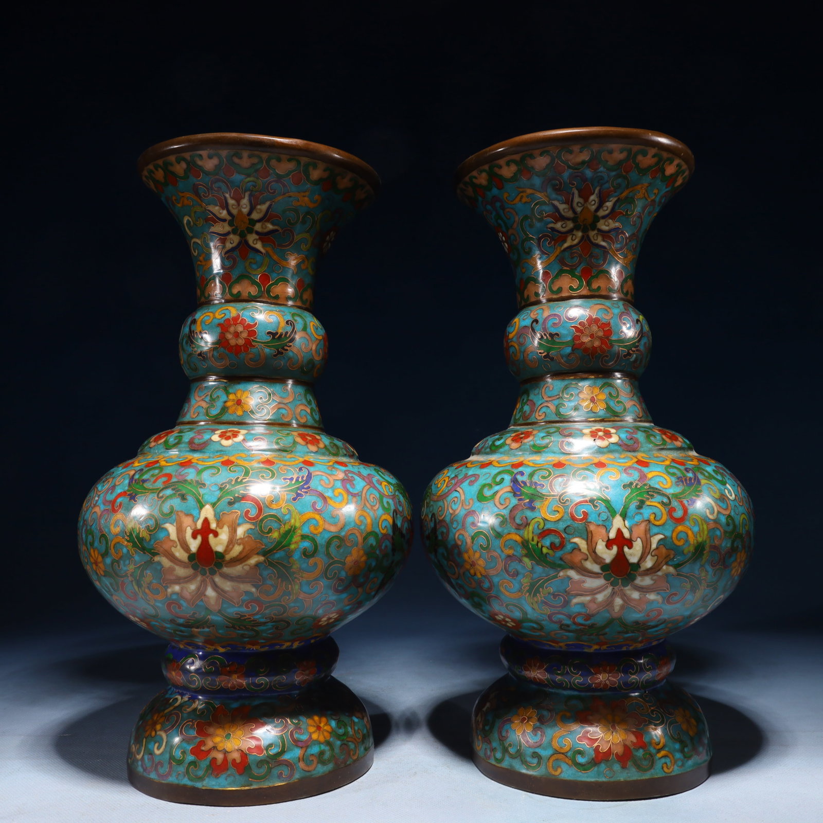 A Pair of Exquisite Cloisonne Lotus Pattern Vases: A Pair of Exquisite Cloisonne Lotus Pattern Vases,Qing Dynasty,China,Qianlong Six-character Mark,Size:7.5inx12.6in,Weight:8850g 一对景泰蓝缠枝莲纹