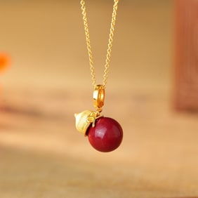 An Exquisite Sterling Silver-Gold Plated Inlaid Cinnabar Gourd Pendant