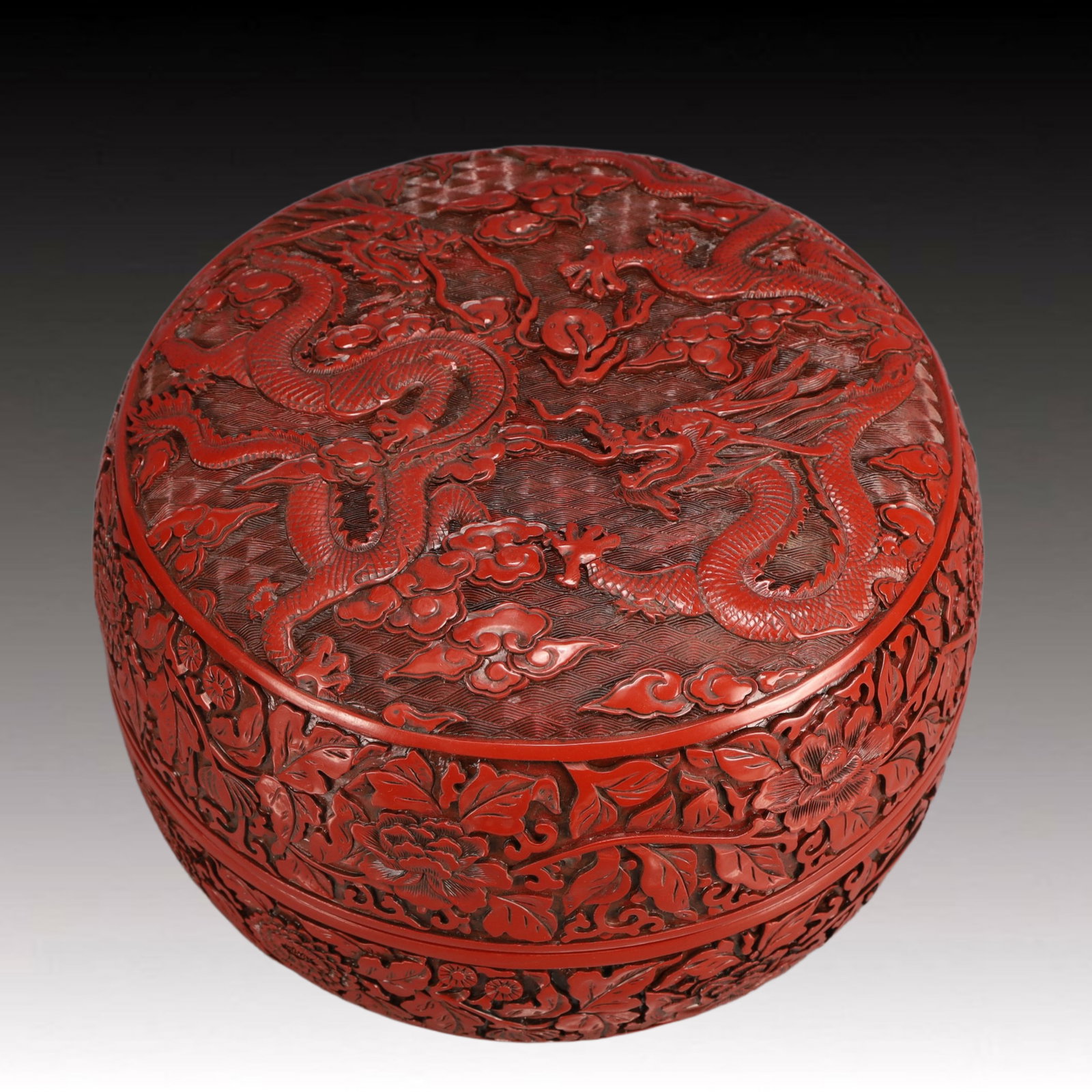 An Exquisite Carved Red Lacquer Lotus and Dragon Pattern Cover Box,Qing Dynasty, China,Qianlong: An Exquisite Carved Red Lacquer Lotus and Dragon Pattern Cover Box,Qing Dynasty, China,Qianlong Six-character Mark,Size:10.2inx7.9in,Weight:2600g 剔红漆器缠枝ഫ