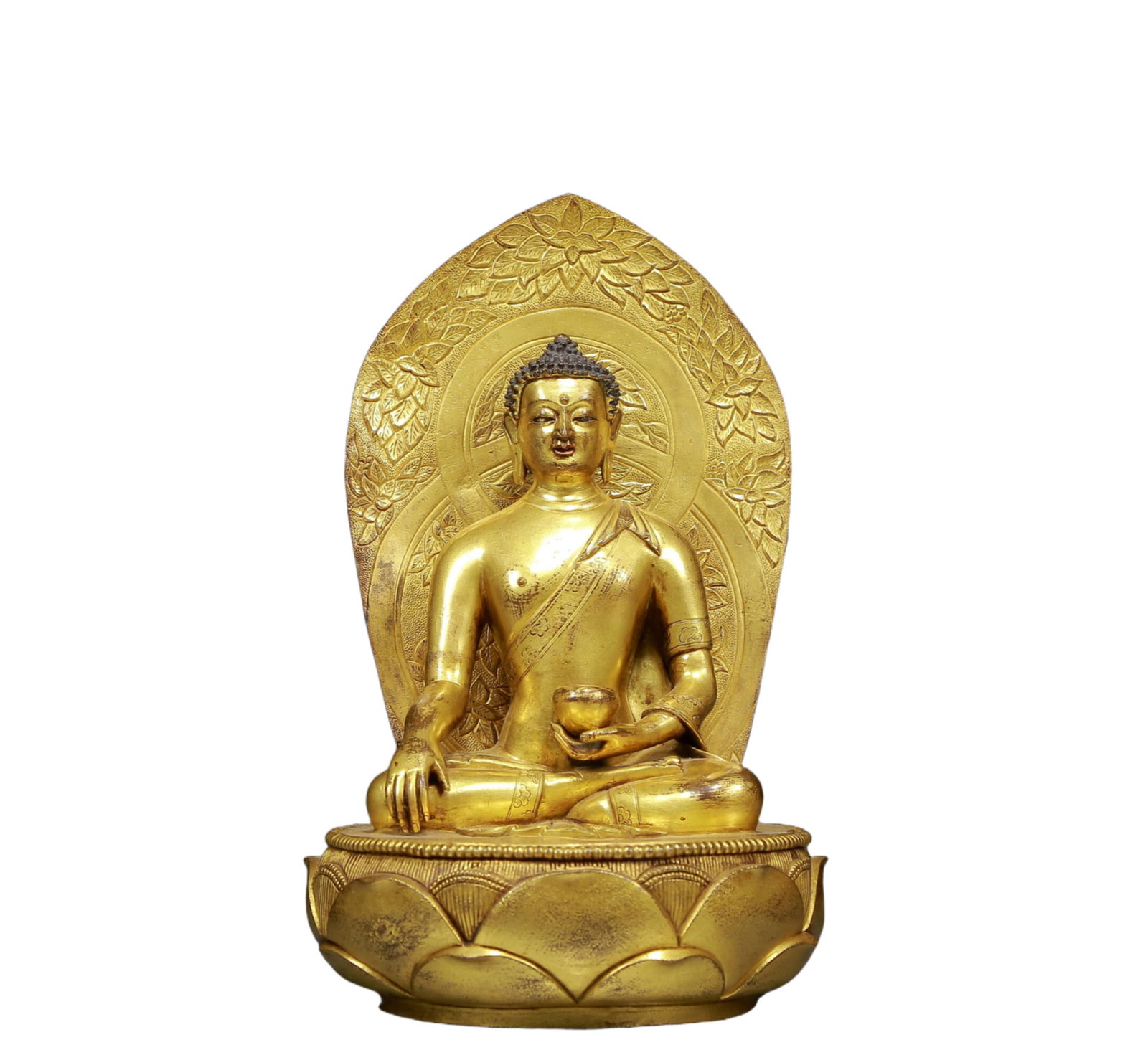 A Solemn Gilt Bronze Statue of Sakyamuni: A Solemn Gilt Bronze Statue of Sakyamuni,Ming Dynasty, China,Size:5.9inx9.4in,Weight:2675g 铜鎏金释迦摩尼像，明代