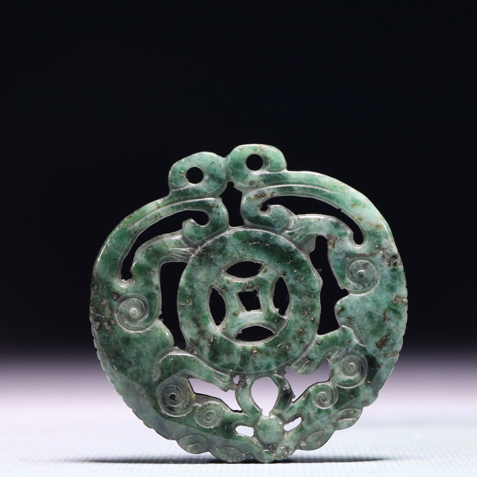 An Exquisite Jadeite Beast Pattern Pendant: An Exquisite Jadeite Beast Pattern Pendant,Qing Dynasty,China,Size:2inx2in,Weight:28.7g 翡翠兽纹挂件,中国清代