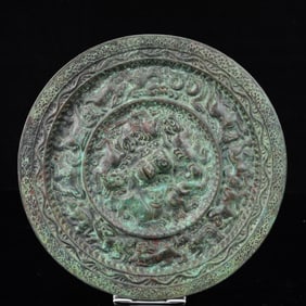 An Archaic Bronze Animal Pattern Round Mirror