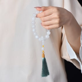 An Exquisite White Jade Pendant
