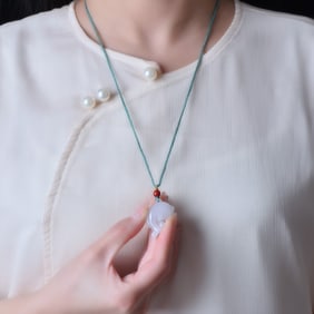 An Exquisite Jadeite Pendant