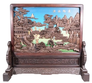 An exquisite zitanwood lacquered and gold-embedded table screen with a pattern of immortals