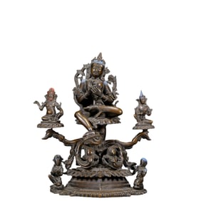 A Solemn Bronze Statue of Green Tara