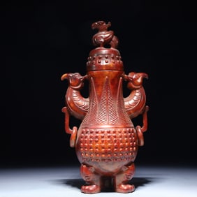 An Exquisite Archaic Jade Phoenix-Ears Tripod Bottle