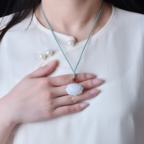An Exquisite Jadeite Lotus Pattern Pendant