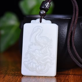 An Exquisite White Jade Animal Pattern Pendant