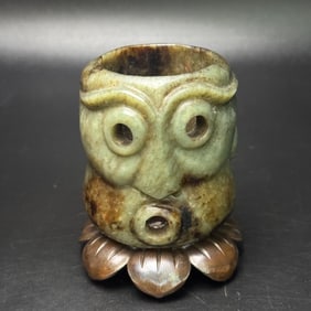 An Exquisite White Jade Figure-Face Pattern Pendant