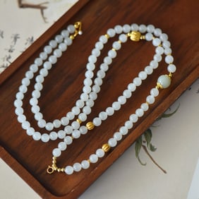 An Exquisite Sterling Silver-Gold Plated Inlaid White Jade Bracelets