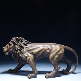 An Exquisite Bronze Lion Ornament