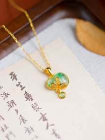 An Exquisite Sterling Silver-Gold Plated Inlaid Jadeite Gourd Pendant