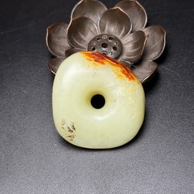 An Exquisite White Jade Pendant