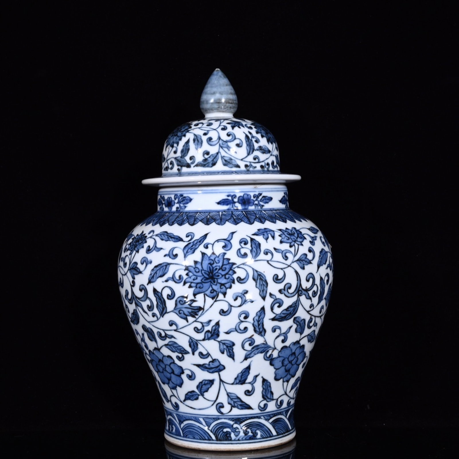 An Exquisite Blue and White Lotus Pattern Jar with Cover: An Exquisite Blue and White Lotus Pattern Jar with Cover,Qing Dynasty,China,Qianlong Six-character Mark,Size:10.2inx5.9in