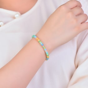 An Exquisite Greenish Jade Bracelets