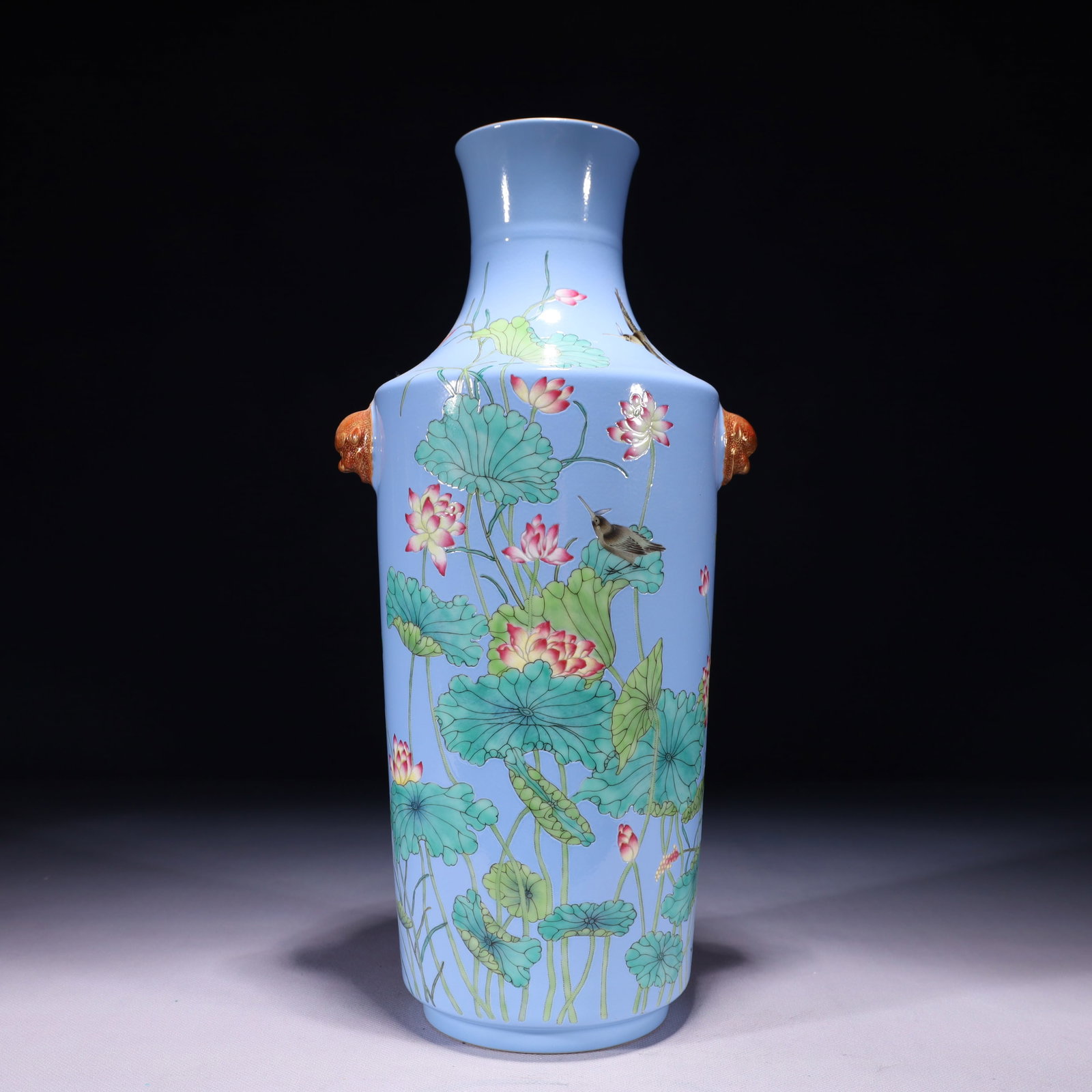 An Exquisite Blue Ground Famille-Rose Painted Gold Flower and Bird Pattern Beast-Ears Vase,with poem: An Exquisite Blue Ground Famille-Rose Painted Gold Flower and Bird Pattern Beast-Ears Vase,with poem,Qing Dynasty,China,Qianlong Six-character Mark,Size:6.7inx5.5inx14.6in,Weight:2000g 蓝地