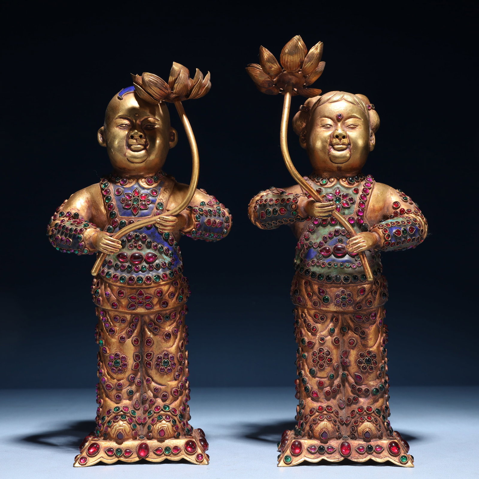 A Pair of Exquisite Gilt Bronze Inlaid Gems Figure Ornaments: A Pair of Exquisite Gilt Bronze Inlaid Gems Figure Ornaments, Tang Dynasty,China, Zhenguan Four-character Mark, Size:3.9inx2.8inx12.2in,(Box)15.4inx15.4inx5.5in,Weight:2100g 一对铜&#