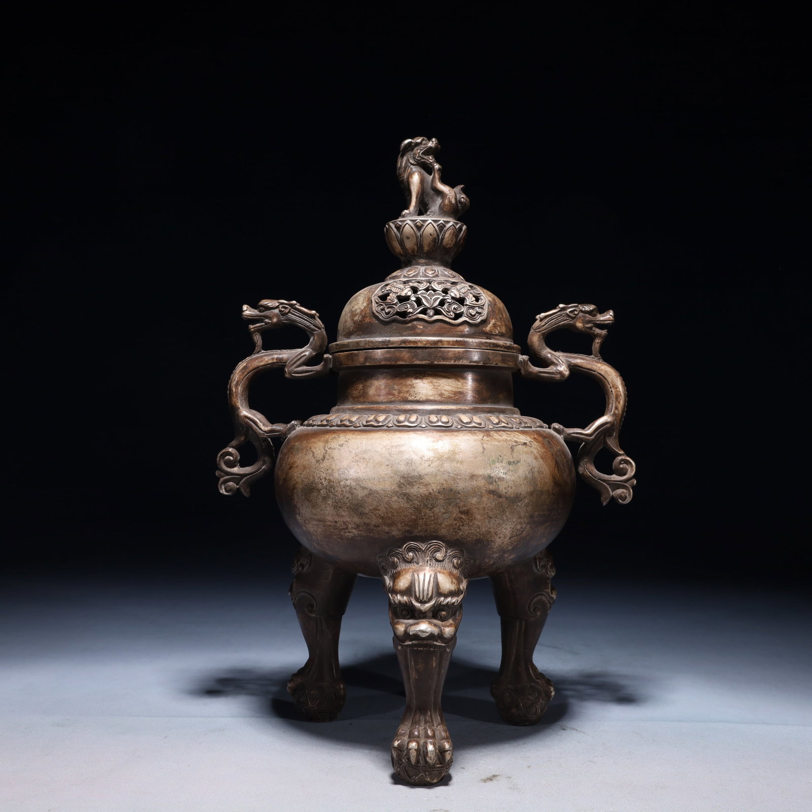An Exquisite Silver-plated Bronze Flower Pattern Double-Ears and Tripod Censer: An Exquisite Silver-plated Bronze Flower Pattern Double-Ears and Tripod Censer,Ming Dynasty,China,Xuande Six-character Mark,Size:8.3inx5.5inx12.2in,Weight:2400g 铜镀银花卉