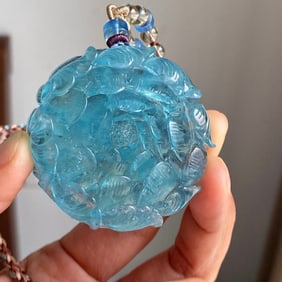An Exquisite Aquamarine Peony Pendant
