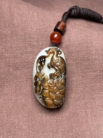An Exquisite White Jade Peacock Pattern Pendant