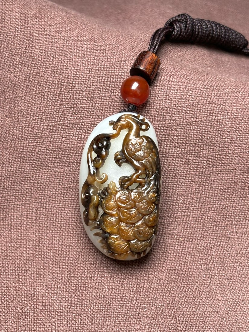An Exquisite White Jade Peacock Pattern Pendant: An Exquisite White Jade Peacock Pattern Pendant,Qing Dynasty,China,Size:49mmx27mmx19mm,Weight:51g 白玉孔雀纹挂件,中国清代