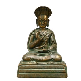 A Solemn Bronze Statue of Guru