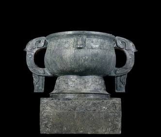 A precious bronze double-eared stove with auspicious animal patterns