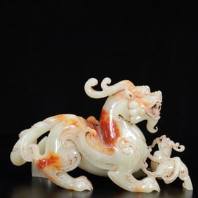 An Exquisite White Jade Auspicious Beast Ornament