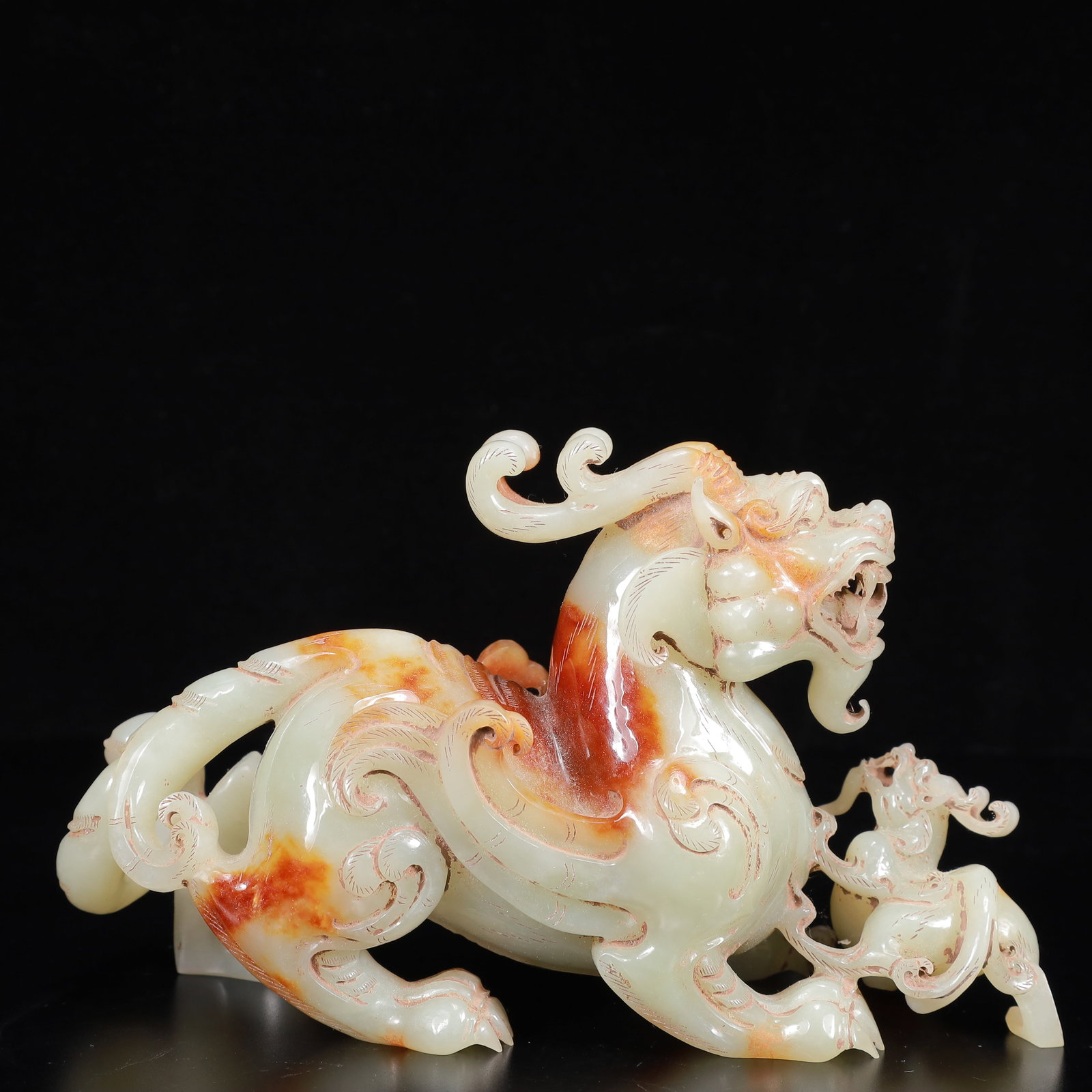 An Exquisite White Jade Auspicious Beast Ornament (1 of 14)