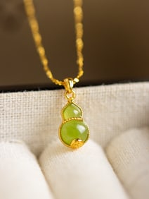 An Exquisite Sterling Silver-Gold Plated Inlaid Jasper Gourd Pendant