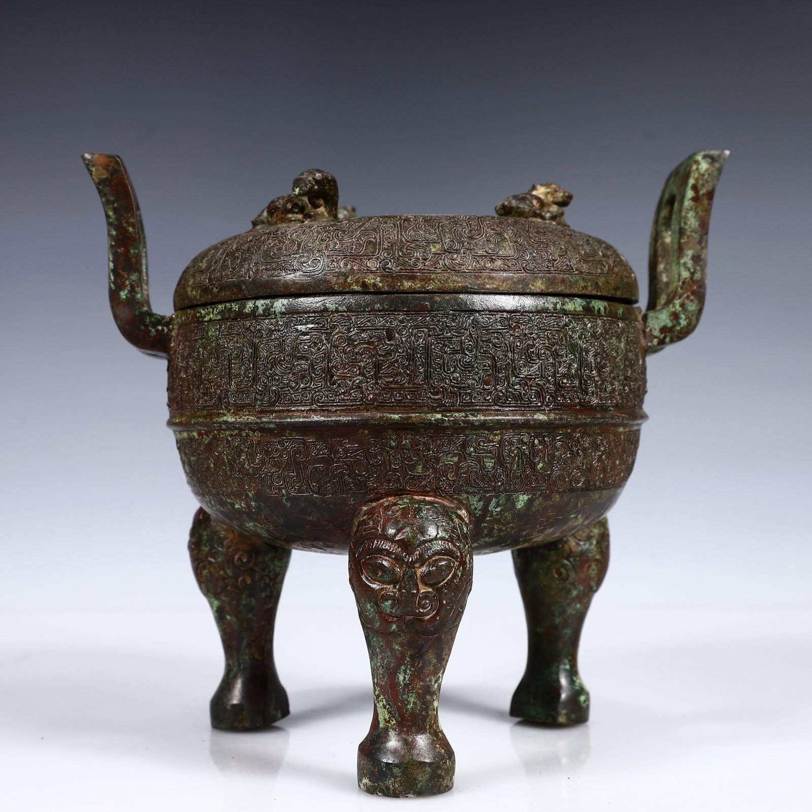 A Rare Bronze Beast Pattern Double-Ears and Tripod Censer,With Inscription: A Rare Bronze Beast Pattern Double-Ears and Tripod Censer,With Inscription,W.Zhou,China,Size:9.1inx7.1inx8.3in,Weight:3050g 青铜兽纹双耳三足香