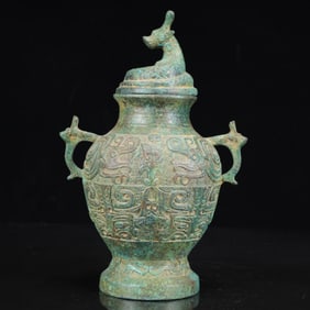 An Archaic Bronze Dragon Pattern Beast-Ears Vase
