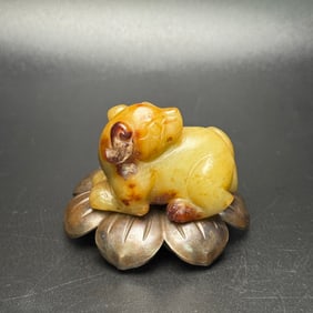 An Exquisite White Jade Dog Pendant
