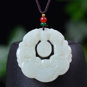 An Exquisite White Jade Auspicious Beast Pattern Pendant