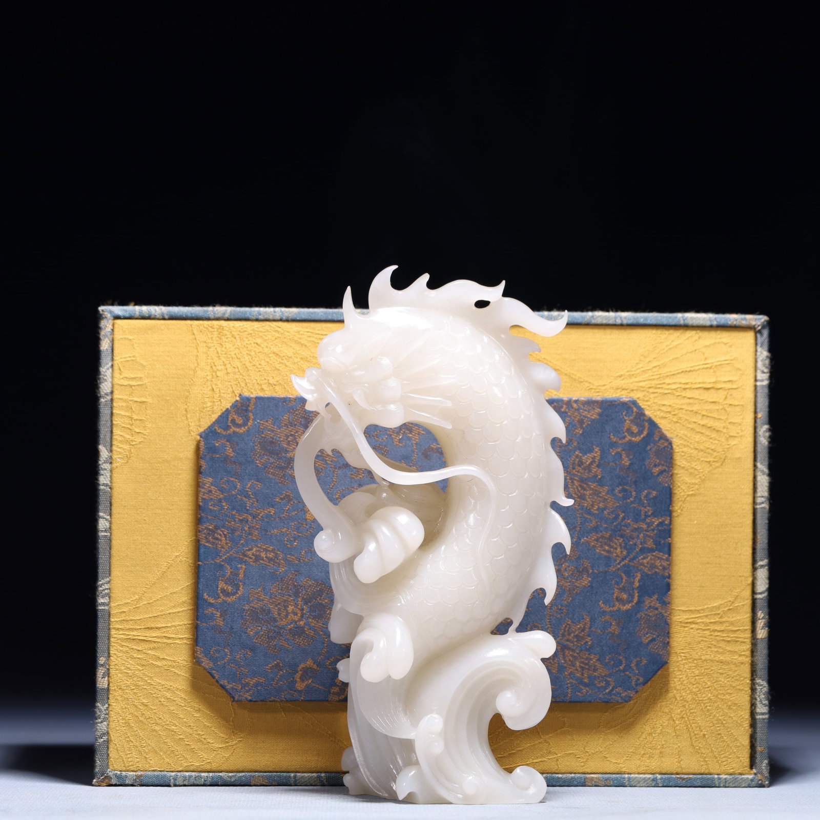 An Exquisite White Jade Seawater and Dragon Ornament: An Exquisite White Jade Seawater and Dragon Ornament,Qing Dynasty,China,Size:2.8inx1.4inx5.9in,Weight:522.8g 白玉海水龙摆件,中国清代