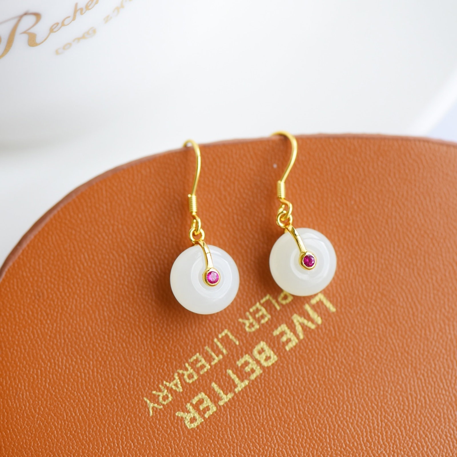 A Pair of Exquisite Sterling Silver-Gold Plated Inlaid White Jade Earrings: A Pair of Exquisite Sterling Silver-Gold Plated Inlaid White Jade Earrings,Size:11mmx11mm 一对纯银镀金镶白玉耳钉