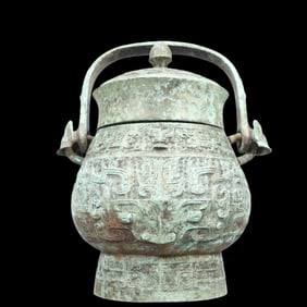 A Precious Bronze Beast-Face Pattern Jar,With Inscription