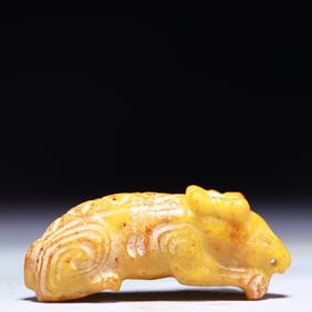 An Exquisite Archaic Jade Auspicious Beast Ornament