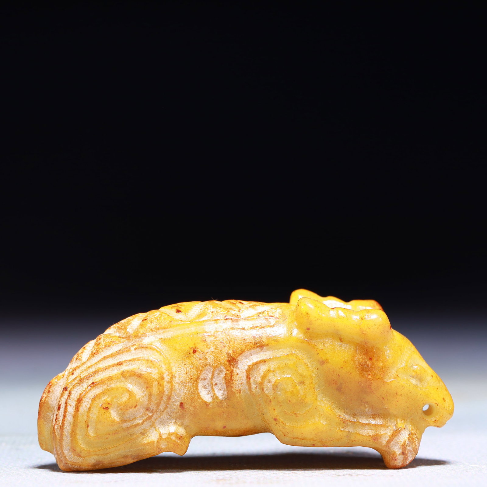 An Exquisite Archaic Jade Auspicious Beast Ornament: An Exquisite Archaic Jade Auspicious Beast Ornament,Ancient Time,China,Size:2.8inx0.8inx1in,Weight:75.6g 高古玉瑞兽摆件中国远古时