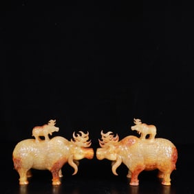 A Pair of Exquisite White Jade Buffalo Ornaments