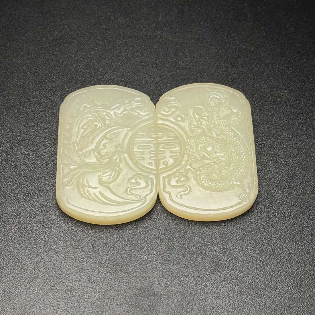 A Pair of Exquisite White Jade Dragon and Phoenix Pattern Pendants: A Pair of Exquisite White Jade Dragon and Phoenix Pattern Pendants,Qing Dynasty,China,Size:46mmx29mmx6mm,Total Weight:38g